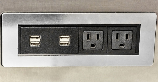 Close up of an electrical outlet with USB ports