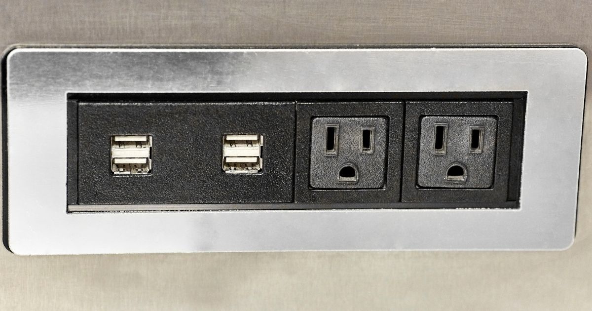 Close up of an electrical outlet with USB ports